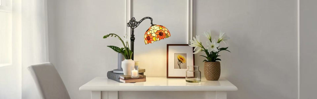 Tiffany stained glass desk lamp adding warm ambient light to a modern home office workspace