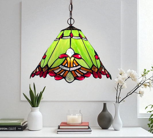 Stained glass pendant lamp shade with green panels, red dots, and metal chain