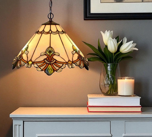 Leaded stained glass pendant lamp shade with floral center and green glass accents