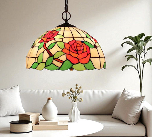 Red rose stained glass pendant lamp shade with green leaves, suspended from chain