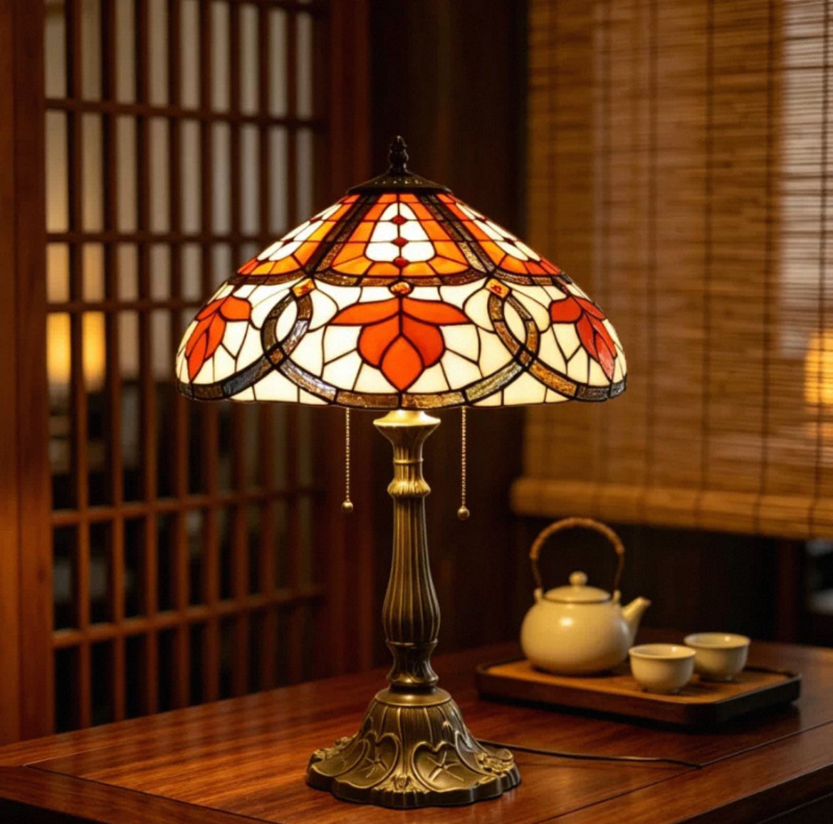 Tiffany table lamp with stained glass shade and bronze metal base, decorative pull chains