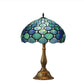 Tiffany table lamp with teal/blue stained-glass hex shade and gold metal base