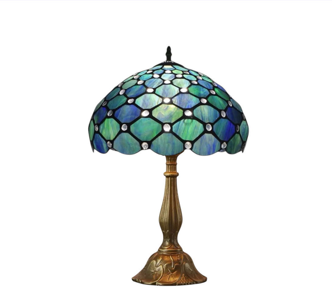 Tiffany table lamp with teal/blue stained-glass hex shade and gold metal base
