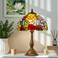 Tiffany table lamp with colorful stained glass floral dome shade and bronze base