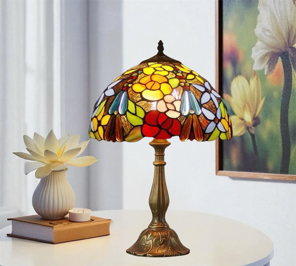 Tiffany table lamp with stained glass floral shade and bronze pedestal base