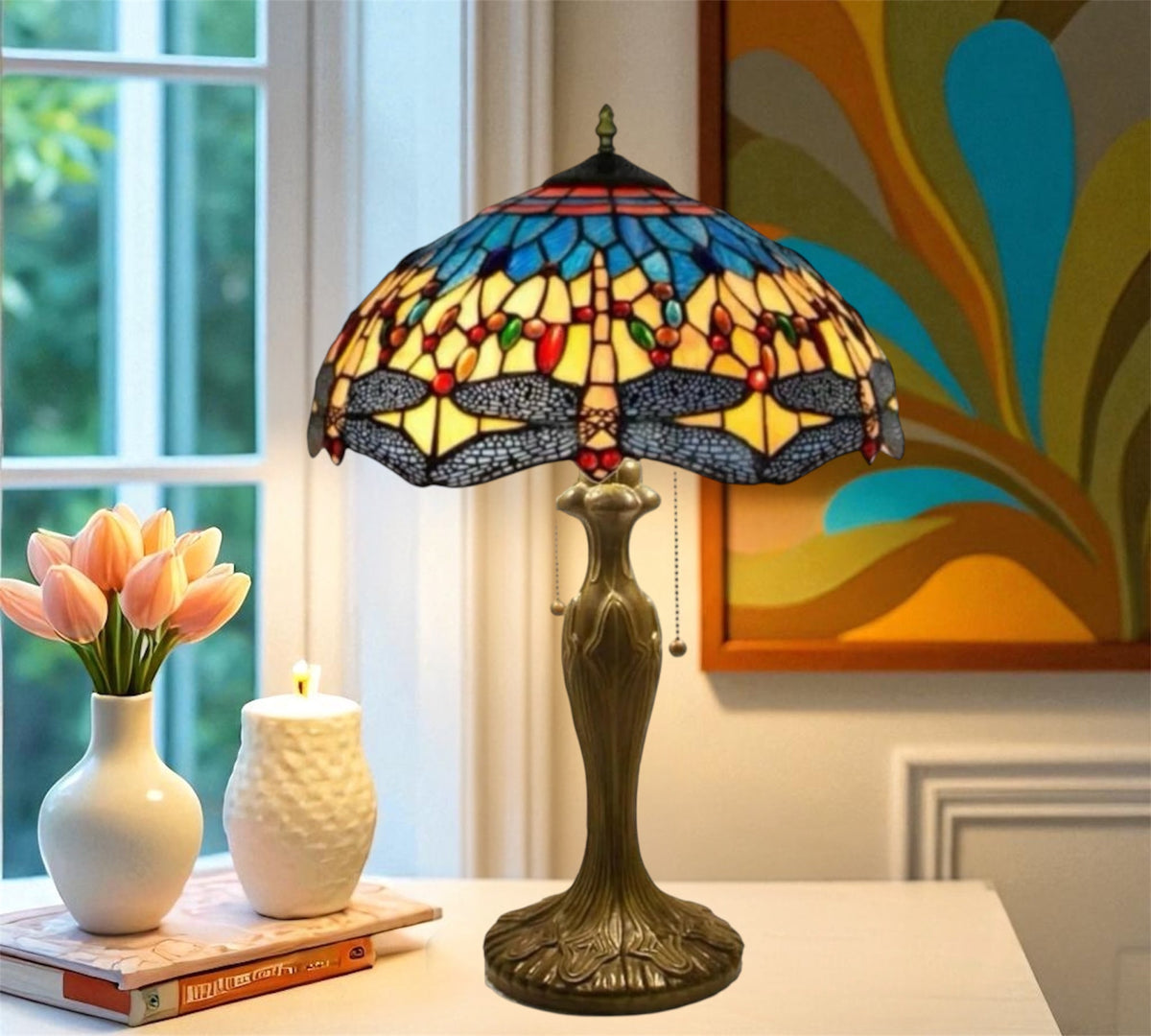 Tiffany-style table lamp with multicolor stained glass shade and bronze base, close side view
