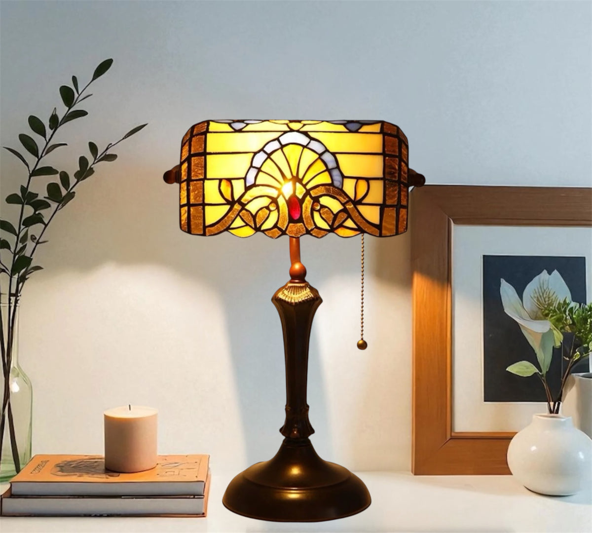 Stained glass table lamp with amber shade and dark bronze base with pull chain