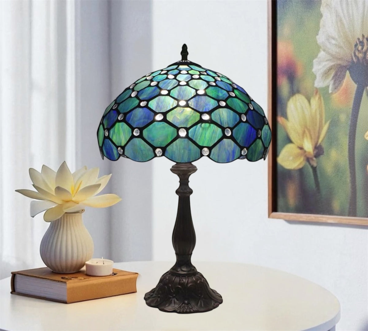 Tiffany table lamp with teal/blue stained-glass hex shade and dark metal pedestal base