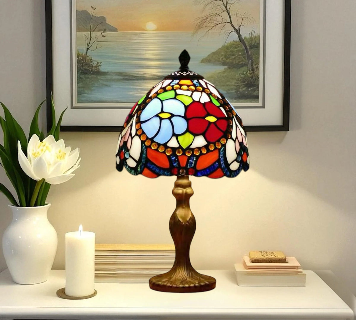 Front view Tiffany table lamp with multicolor stained-glass shade and bronze base
