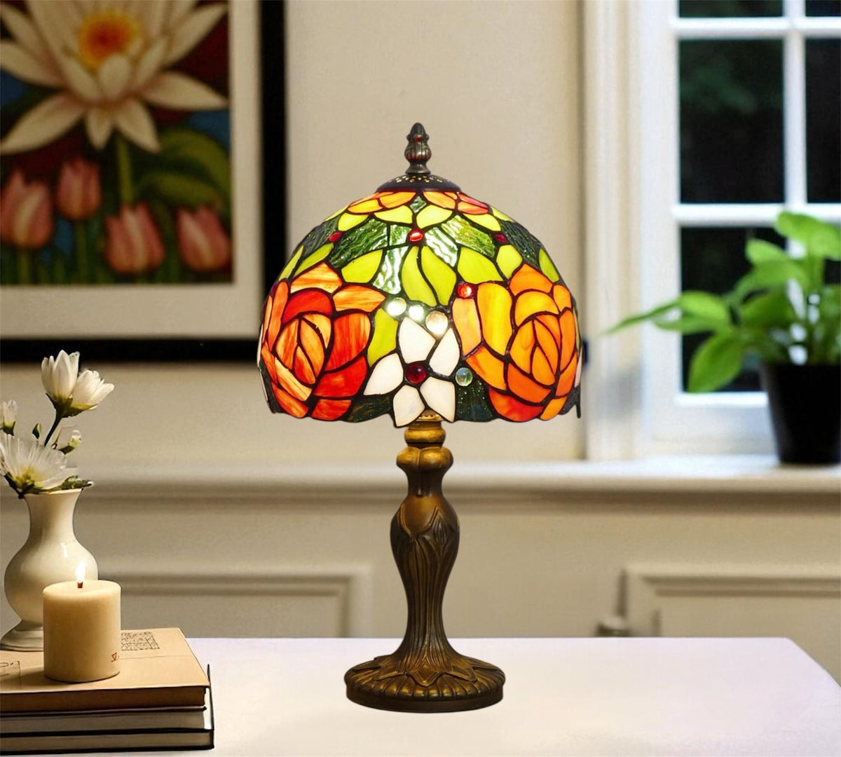 Tiffany-style stained glass table lamp with multicolor dome shade and detailed dark base