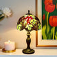 Tiffany style table lamp with stained-glass floral shade and brass-tone base