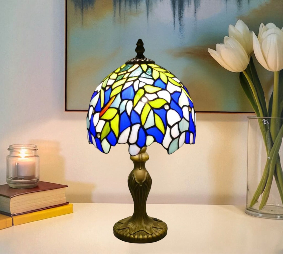Tiffany table lamp with dome stained glass shade in blue, yellow, and white; bronze base