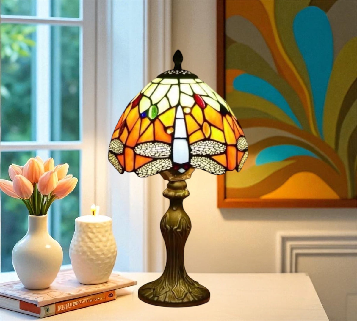 Stained glass table lamp with multicolor tulip-style shade and bronze base