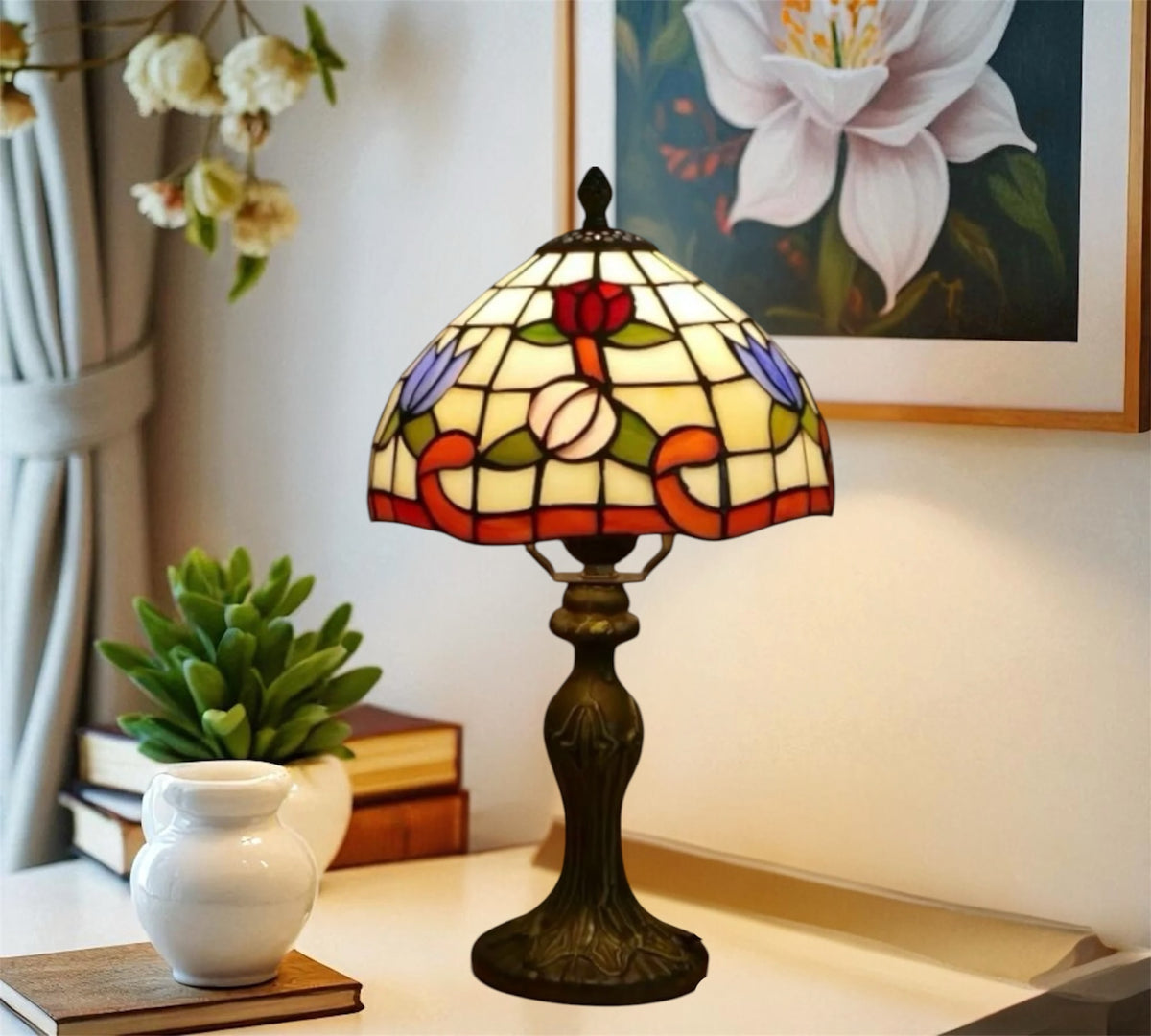 Stained glass table lamp with multicolor floral shade and dark metal base