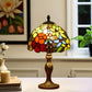 Tiffany-style table lamp with multicolor stained glass dome shade and brass-toned base