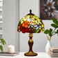 Tiffany-style table lamp featuring multicolor stained glass dome shade on a metal base