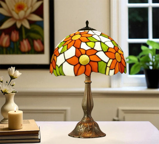 Tiffany-style table lamp with multicolor stained-glass floral shade and bronze base