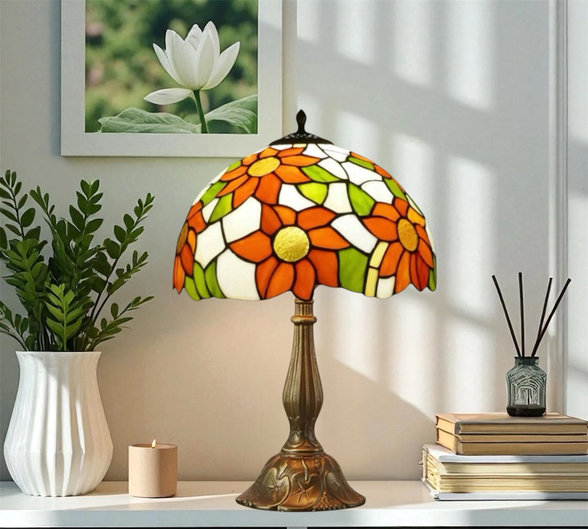 Tiffany-style table lamp with stained-glass flower shade and bronze base, side view