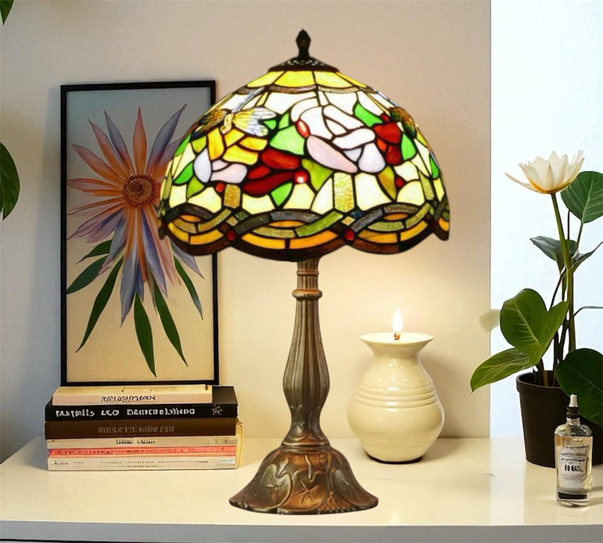 Tiffany-style lamp with stained-glass shade in yellow, red, green, and bronze base