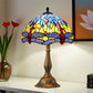 Colorful stained glass Tiffany table lamp with dome shade and bronze metal pedestal base