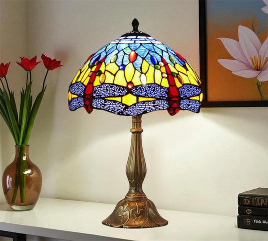 Colorful stained glass Tiffany table lamp with dome shade and bronze metal pedestal base