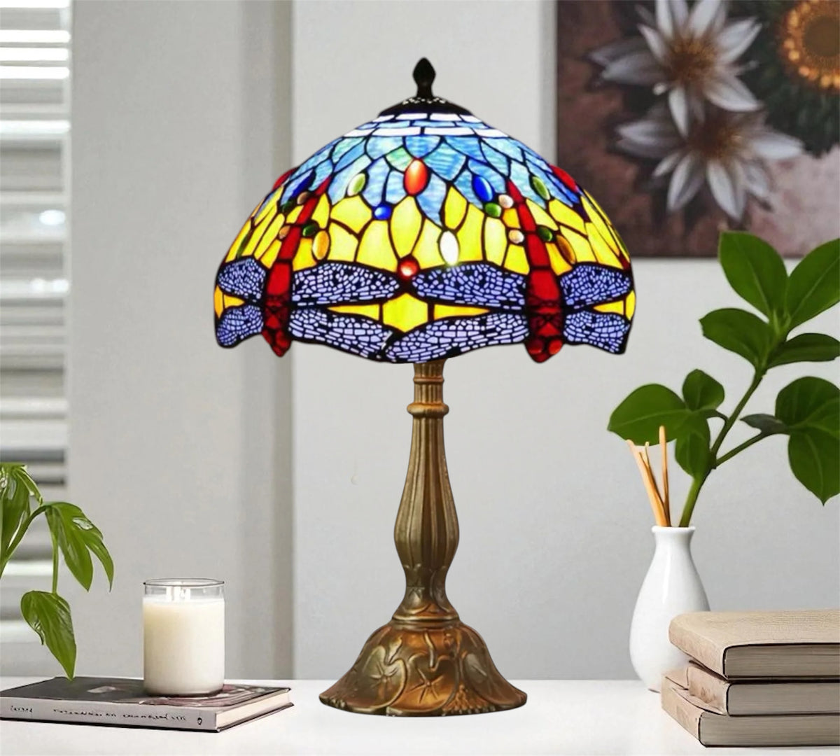 Tiffany-style stained glass table lamp with colorful dome shade and bronze metal base