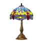 Stained glass Tiffany table lamp with multicolor dome shade and bronze pedestal base