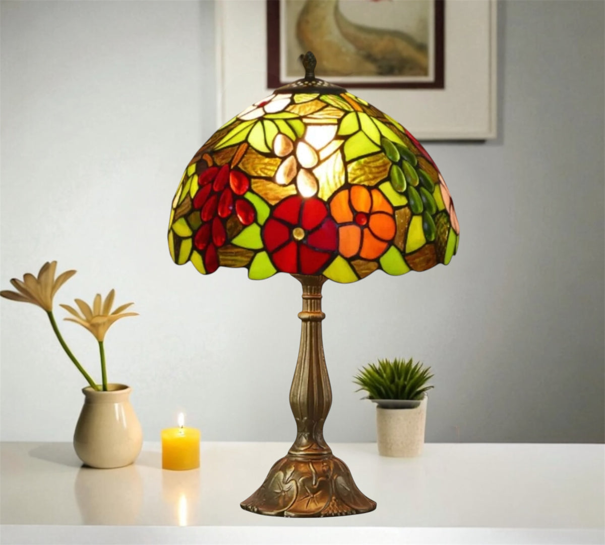 Stained glass table lamp with domed multicolor floral shade and ornate bronze base