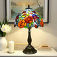 12" stained glass table lamp with multicolor floral shade and bronze metal base
