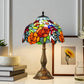 12" stained glass table lamp with rounded multicolor floral shade and bronze base