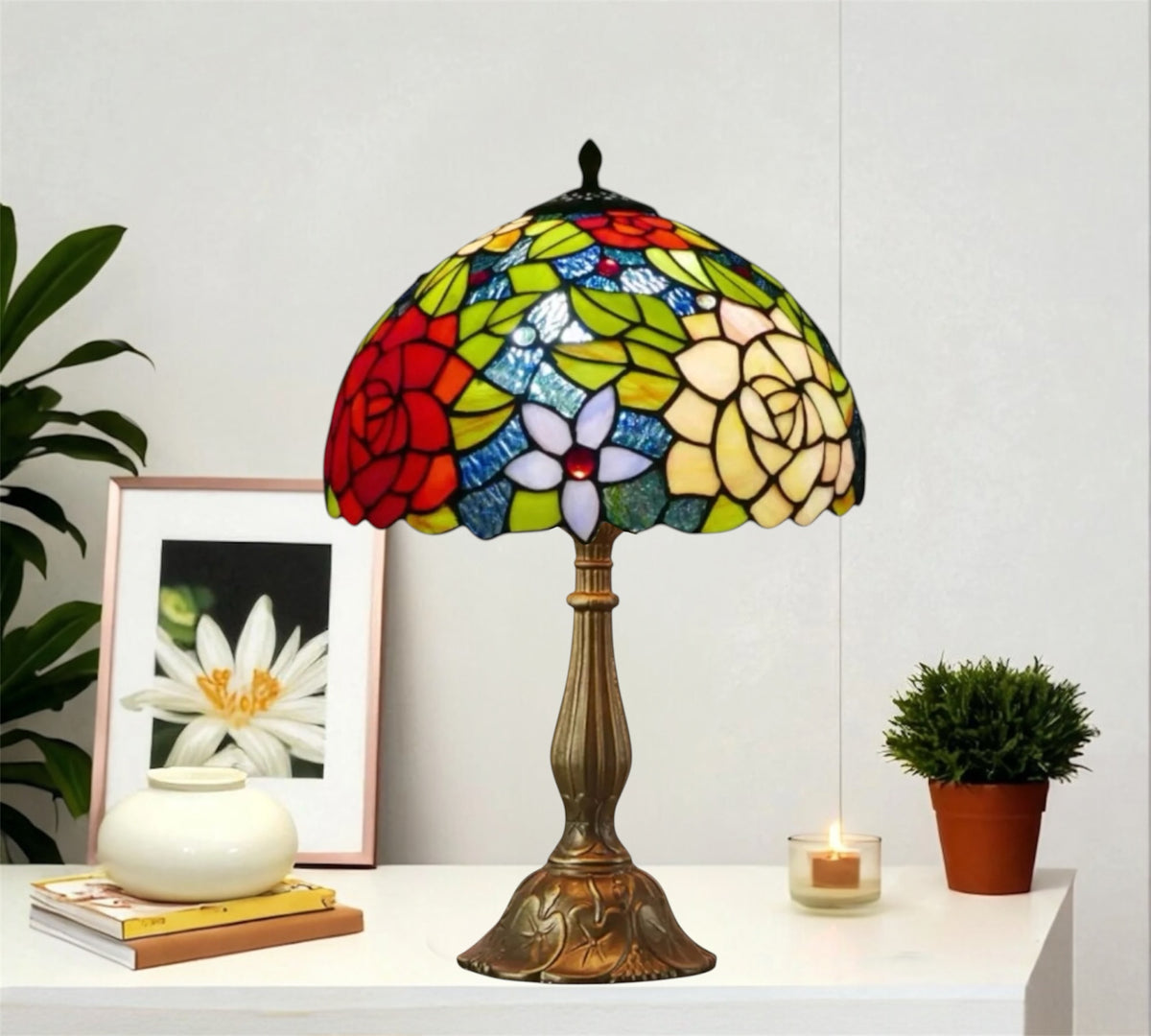 Tiffany-style stained glass table lamp with multicolor dome shade and detailed bronze pedestal base