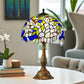 Tiffany-style table lamp with multicolor stained-glass dome shade and bronze pedestal base