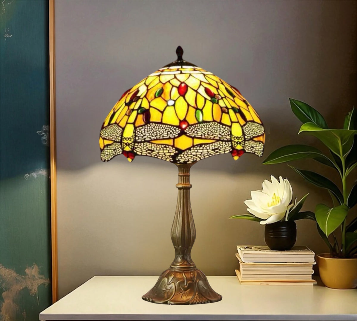 Tiffany-style stained glass table lamp featuring a multicolor shade and bronze metal base