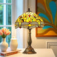 Tiffany-style stained glass table lamp with multicolor shade on a bronze metal base