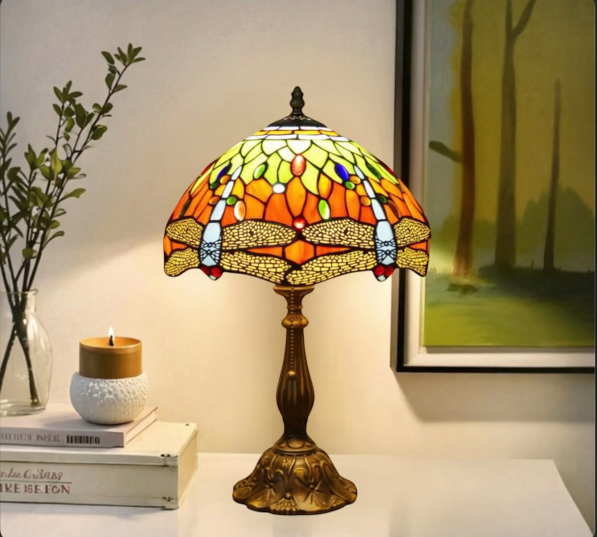 Tiffany table lamp with multicolor stained-glass dome shade and bronze base.