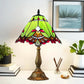 Green stained-glass Tiffany table lamp shade with bronze weighted base