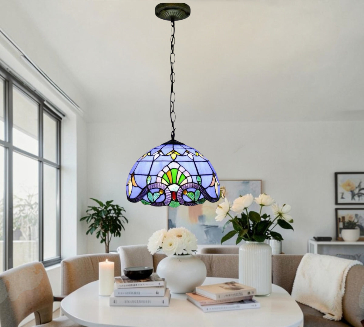Tiffany-style stained glass pendant lamp shade hanging from dark metal chain