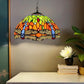 Tiffany-style stained glass pendant lamp dome shade in green, orange, blue, and red glass