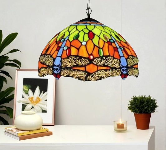 Tiffany-style stained glass pendant lamp overhead view of multicolor mosaic dome shade
