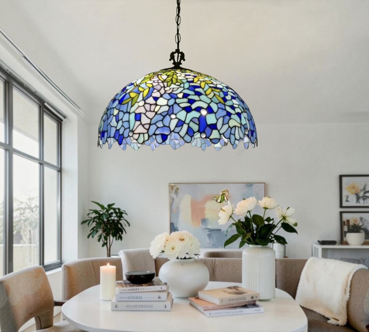 Stained glass pendant lamp shade with blue, yellow, and white mosaic tiles on black chain