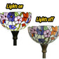 Stained glass torchiere floor lamp shade with dark metal base, two lighting views