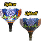 Torchiere stained glass shade with lights-on and lights-off views, dark metal socket