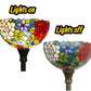 Stained glass lamp shade showing lights on and off, multicolor floral mosaic