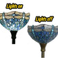 Torchiere lamp shade close-up: blue stained glass, warm lit and unlit