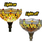 Stained-glass torchiere lamp shades shown lit and unlit, dark metal stem and top trim