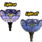 Stained-glass torchiere floor lamp shade shown lit and unlit with dark metal base