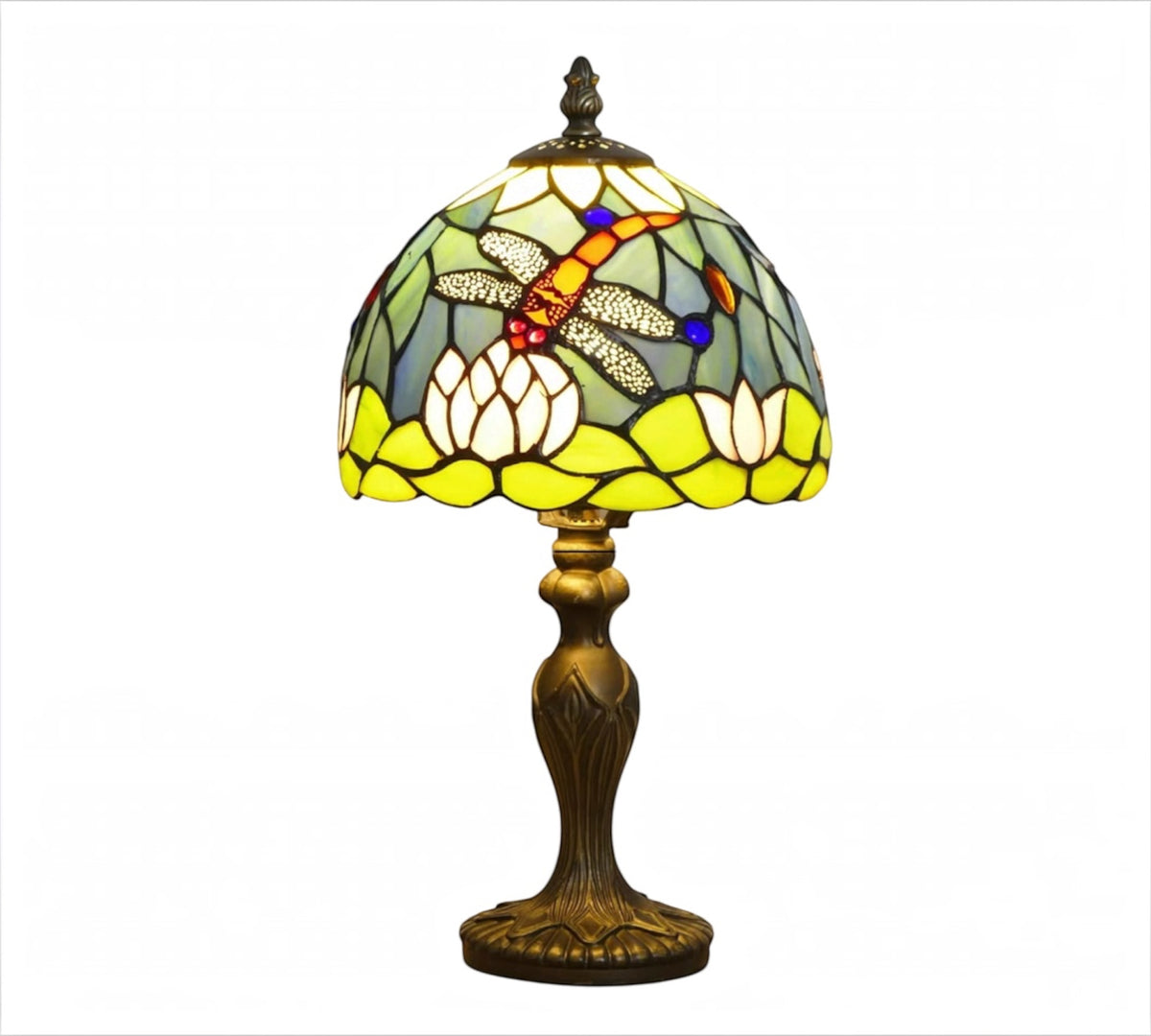 Stained glass table lamp with curved multicolor shade and ornate bronze metal base
