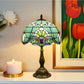 Green stained-glass Tiffany table lamp with bronze base