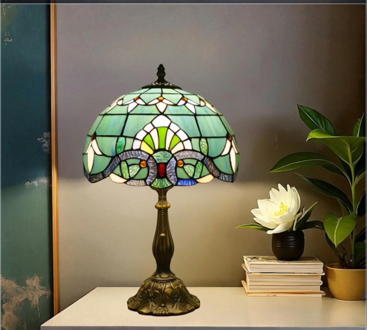 Green stained-glass shade table lamp with bronze pedestal base