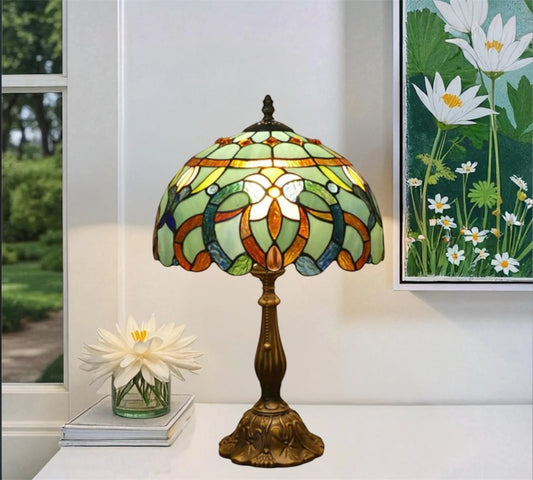 Multicolor stained glass table lamp with scalloped shade and bronze metal base